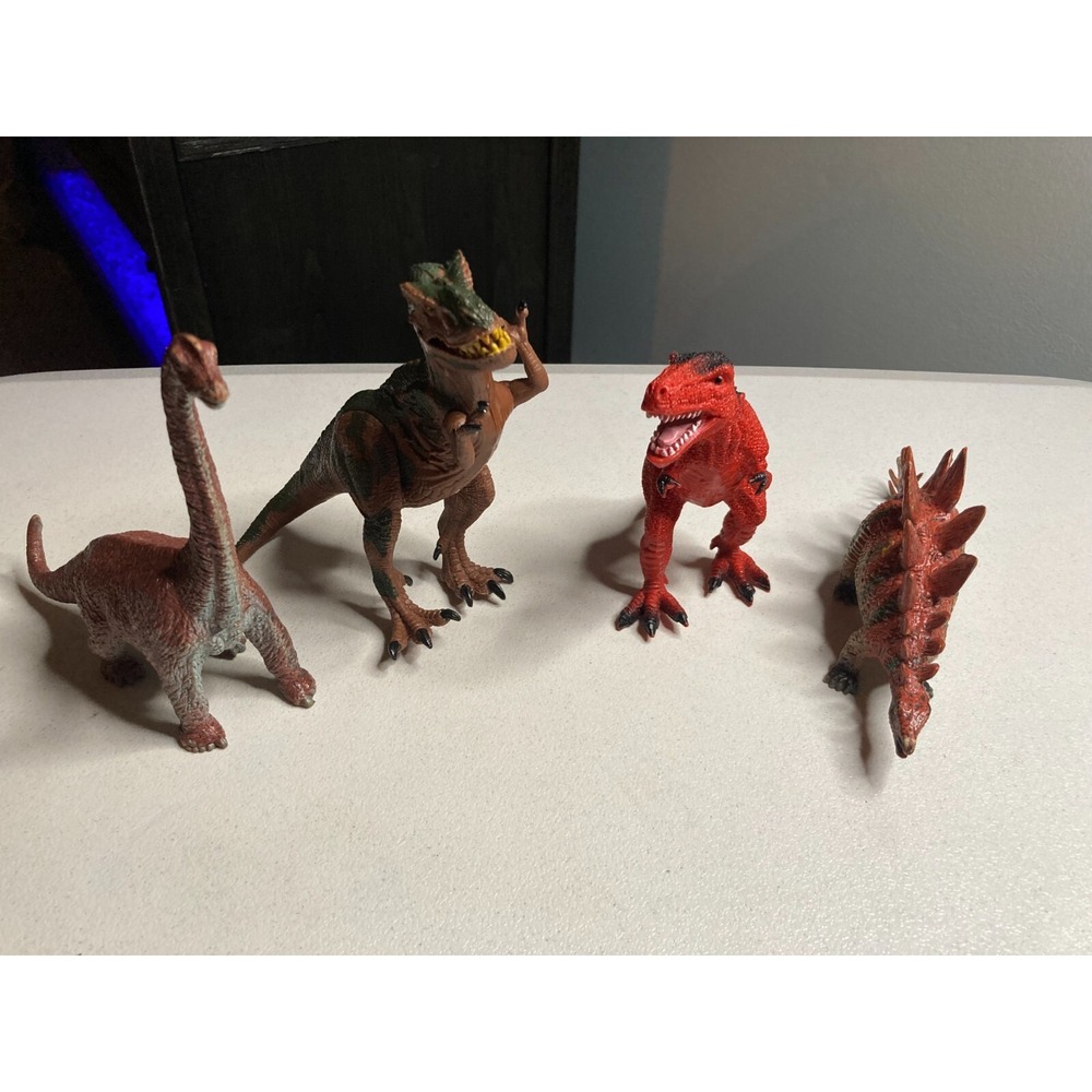 AAA Toy Major Dinosaurs Lot Of 4 Rubber Plastic 2006 and more recent